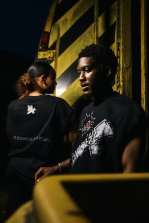 THE NIX TANK TEE: Muzzed Motion.